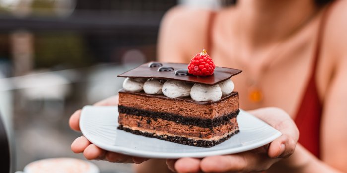chocolate cake with strawberry in dish dessert concept
