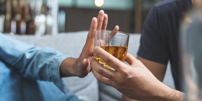 stop alcohol concept person refuse to drink alcohol