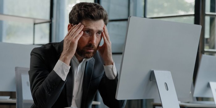 caucasian bearded 40s middle-aged businessman worker employee man typing laptop feel failure upset with lost of informati...