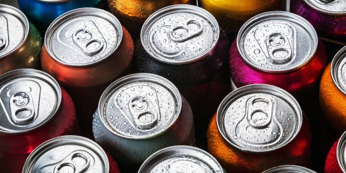 aluminum cans of soda background the view from the top