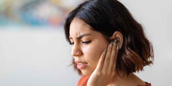 ears pain sick young arab woman suffering from earache at home, upset middle eastern female having otitis illness and hea...