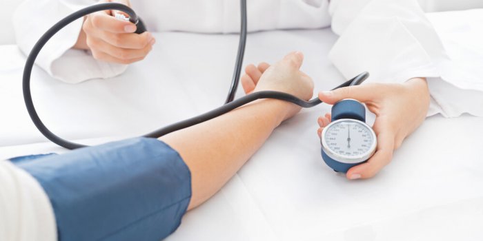 doctor or nurse taking a female patients
