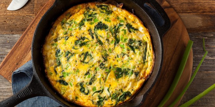 homemade spinach and feta fritatta in a skillet