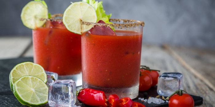 bloody mary cocktail and ingredients, copy space