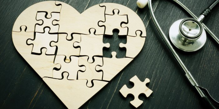 heart disease like heart attack concept puzzle and stethoscope