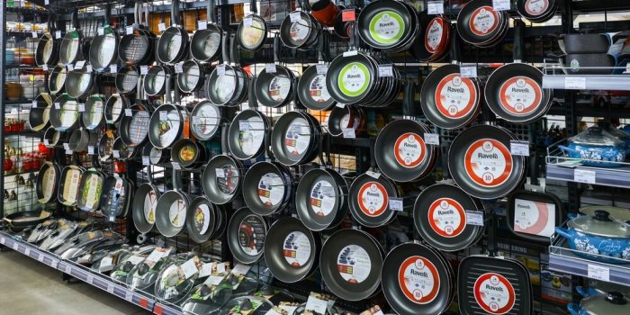 a,store,display,of,various,pans,and,pots,the,pans