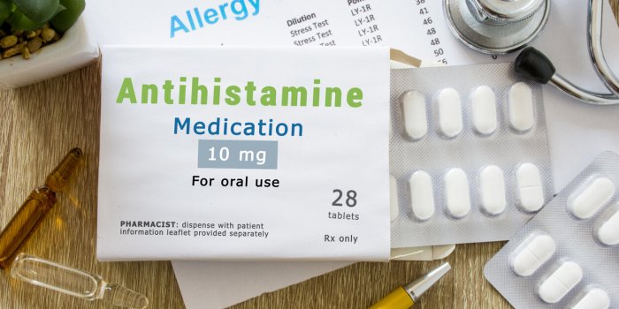 antihistamine medication or allergy drug concept photo on doctor table is pack with word antihistamine medication and pil...