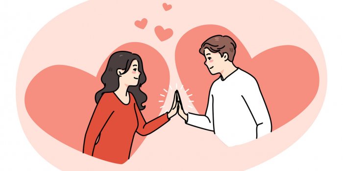 happy young man and woman touch hands look in eyes feel in love smiling caring couple have close intimate bonding moment ...