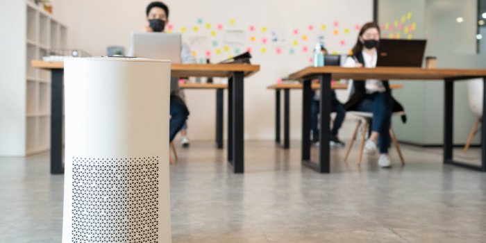 air purifier in modern office for fresh air and removal dust pm