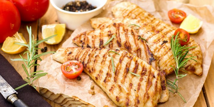 grilled pork escalopes with rosemary, lemon and cherry tomatoes