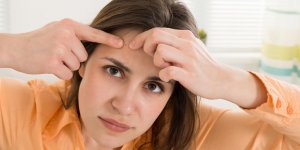 Bouton qui ne part pas : un signe de cancer de la peau ?